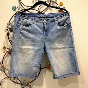 Signature Levi’s Strauss distressed denim shorts .